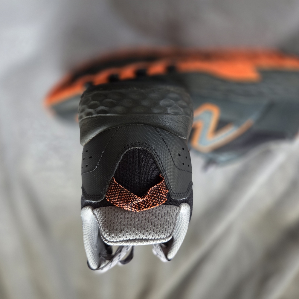 New Balance Men's Athletic Shoes Black with Orange Accents - Picture 6 of 6